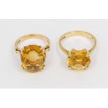 Two citrine and 9ct gold rings, comprising one set with an oval stone, approx 16 x 12mm, size L,