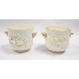 A pair of 19th century Minton jardinieres, twin-handled, with gilt rims and pronounced porcelain