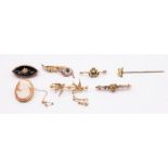 A collection of early 20th century gold brooches, to include a Edwardian 15ct gold pearl set swallow