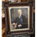 Pair of hand tinted Edwardian framed photographs of man and woman