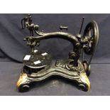 A small cast-iron table-top sewing machine, c.1860s