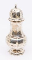 A George V silver baluster shaped octagonal caster, domed pieced cover, hallmarked by Edward