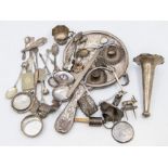 A collection of silver to include: Mostly broken or missing parts, including one silver mirror back,