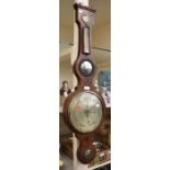 A George III mahogany banjo barometer