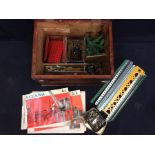 A collection of early 20th Century Meccano with instructions, in 19th Century box