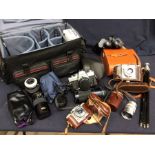 Collection of photographic equipment, to include cased automatic camera and lenses and other