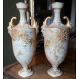 *Item to be collected from Friargate, Derby* A pair of Royal Worcester blush ivory pedestal