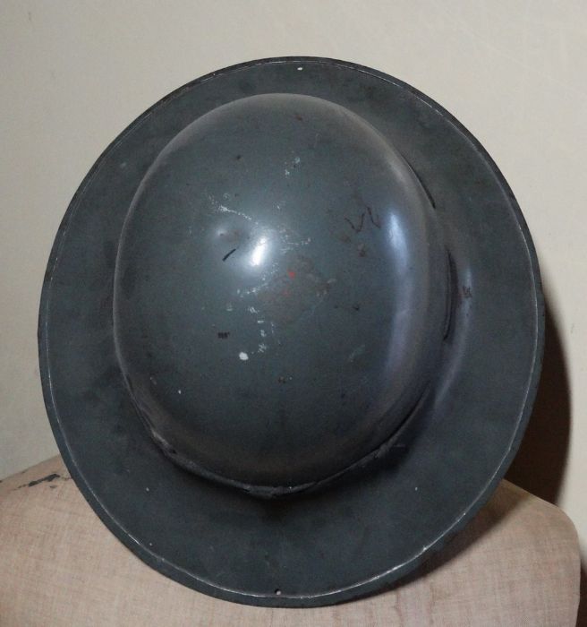 *Item to be collected from Friargate, Derby* A World War II helmet, dated 1941, size 7, imprinted