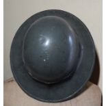 *Item to be collected from Friargate, Derby* A World War II helmet, dated 1941, size 7, imprinted