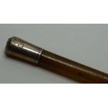 *Item to be collected from Friargate, Derby* A Victorian rhino horn swagger stick, with white