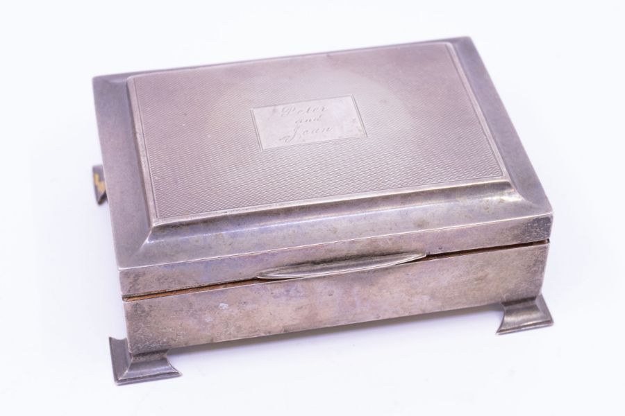 *Item to be collected from Friargate, Derby* A QEII silver rectangular cigarette box, the slightly