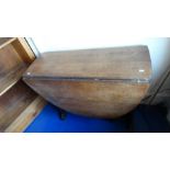 *Item to be collected from Friargate, Derby* An oak gate-leg drop leaf table, barley-twist supports,