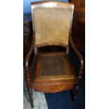 *Item to be collected from Friargate, Derby* A 19th Century mahogany bergere commode armchair,