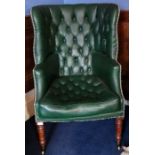 *Item to be collected from Friargate, Derby* A 19th century button back fireside armchair, turned