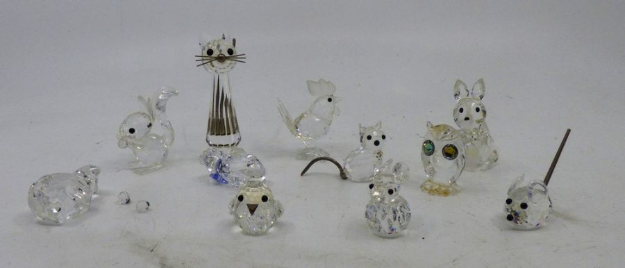 A collection of Swarovski Crystal glass animals, to include a Squirrel, cats fox etc, tallest just