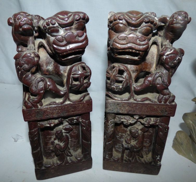 A pair of 19thC soapstone dogs of foe, another taller figure and a smaller one both of soap stone, - Image 2 of 5