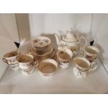 Royal Albert Moss Rose tea set to include a teapot, 26 pieces, 2 cups cracked.