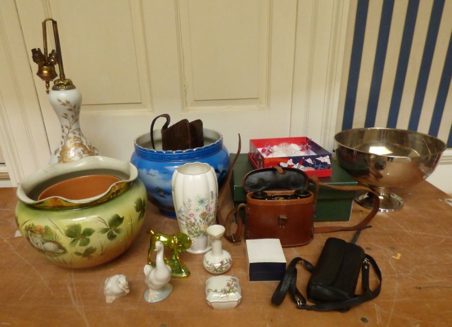 A mixed lot to include 2 Jardinières, binoculars, a tall glass Victorian lamp, a handbag an Aynsley