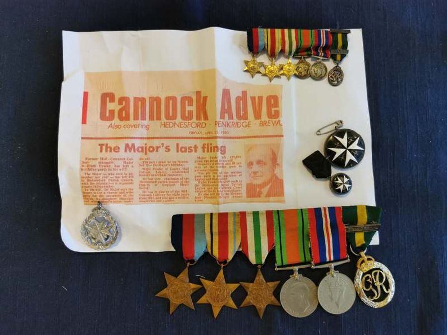 A group of six WW2 medals on a wearing bar, together with a matching set of period miniatures, and 3