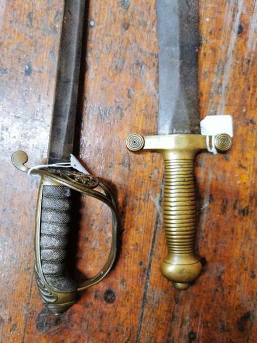 A pair of swords: A Victorian cavalry sword, with Royal Cipher, plus a French Brass handled