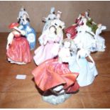 A collection of Royal Doulton Figurines, all appear in good condition, tallest standing 20cm high (