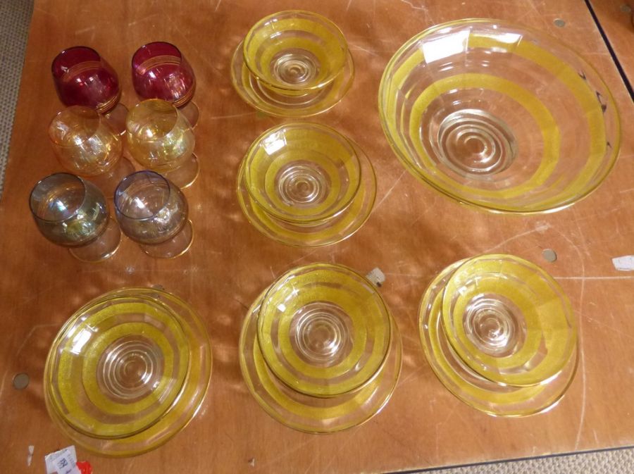 A set of 6 coloured glass shot glasses C1980's and a yellow pressed glass banded  fruit set to