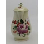 A creamware jug and cover circa 1780, with entwined handle and decorated with handpainted flowers