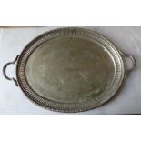 A Silver plated engraved presentation tray 1886, with Greek Key decoration, measures 60cm across