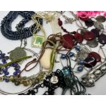 A selection of metal bead and other material contemporary and vintage costume jewellery. Approximate