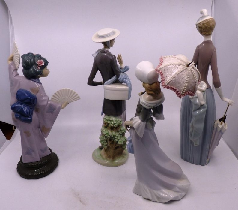 A group of LLadro figures all in good condition, The pink umbrella does detach, the tallest figure - Image 2 of 4