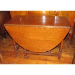 A nineteenth century oak gate leg, dropleaf table. 107 cm long.