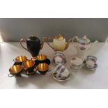 Quantity of Foley china coffee sets to include; black and gilt part service, Cornflower pattern 6