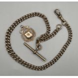 A 9ct rose gold Albert watch chain, with a T Bar and fob ornament. Total approximate weight 44.