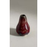 A Ruskin Pottery miniature high fired flambé glaze vase Height 4cm Marked Ruskin England Condition