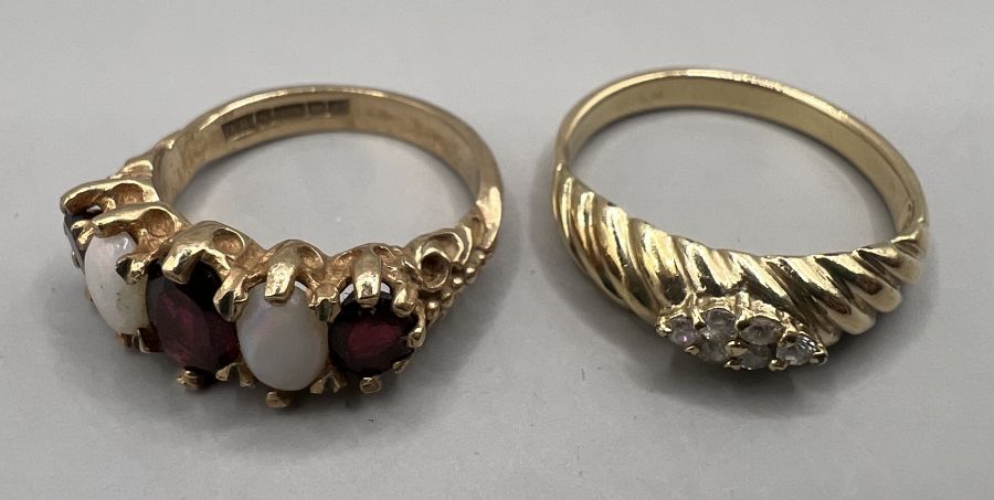 Two dress rings: An opal and garnet set 9ct gold half hoop ring, approximate gross weight 4.3 grams, - Image 4 of 4