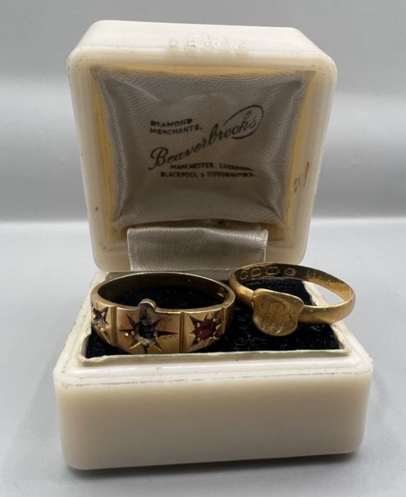 Two Antique rings in as found condition comprising a small 22ct gold signet ring, with cut shank,