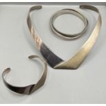 A sterling silver modernist collar and matching bracelet along with a Links of London triple