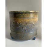 A Ruskin Pottery blue green crystalline glaze footed planter with slip trail carved floral band