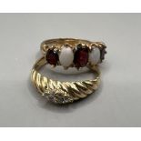 Two dress rings: An opal and garnet set 9ct gold half hoop ring, approximate gross weight 4.3 grams,