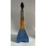 A Ruskin Pottery moulded crystalline glaze blue orange and green “rocket” lamp base Height 36cm