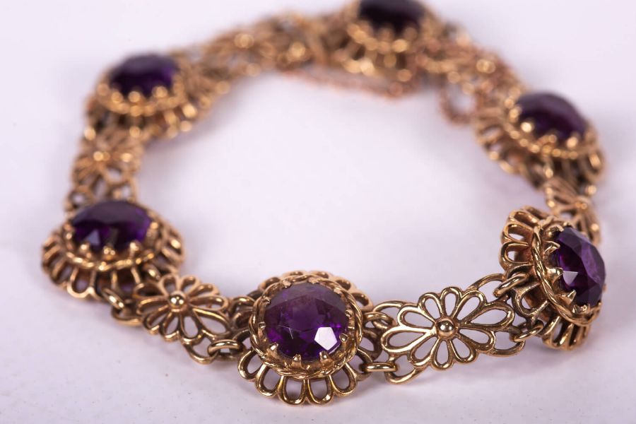 An Amethyst bracelet set with six very fine deep coloured Amethysts in yellow metal in a floral - Image 3 of 3