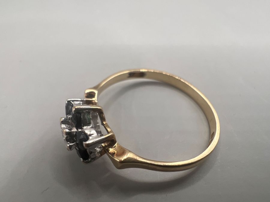 A 9ct gold diamond and sapphire cluster ring. Size N. Gross weight approximately 1.6 grams. - Image 3 of 5