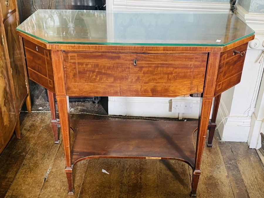 A George III mahogany and satinwood banded small sideboard, in the manner of Thomas Sheraton,