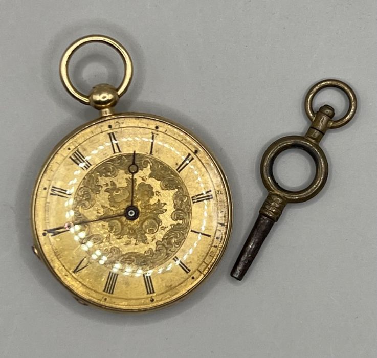 Late 19th Century ladies yellow metal fob watch, with yellow metal dial featuring floral pattern and