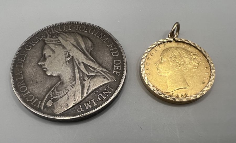 A Victorian Sovereign 1853 (young head) in a 9ct gold pendant frame plus a Victorian silver crown
