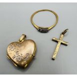 A 9ct gold heart locket with a cross pendant, total weight approximately 2.8 grams, and an 18ct