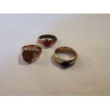 Three stone set rings: Two in 9ct gold and the third in yellow metal, stamped 9ct. Approximate gross