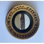 An early 19th cent convex mirror of small proportions
