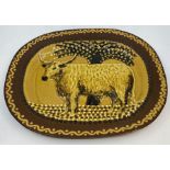 A Devon slipware pottery charger