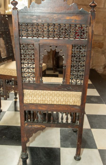 A pair of 19th century carved Middle Eastern hardwood chairs, profusely carved throughout with - Image 2 of 2